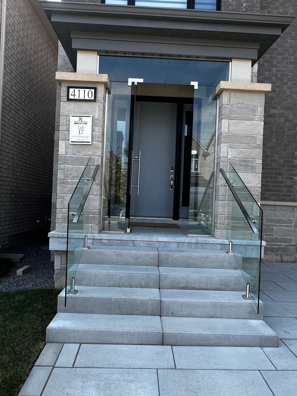 Exterior Railings — Glass and aluminum railings for entry steps, porches, terraces and decks — frameless on spigots or base shoes, clear or tinted.